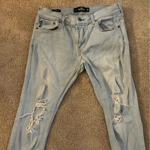 Hollister men’s jeans literally blue with rips and holes